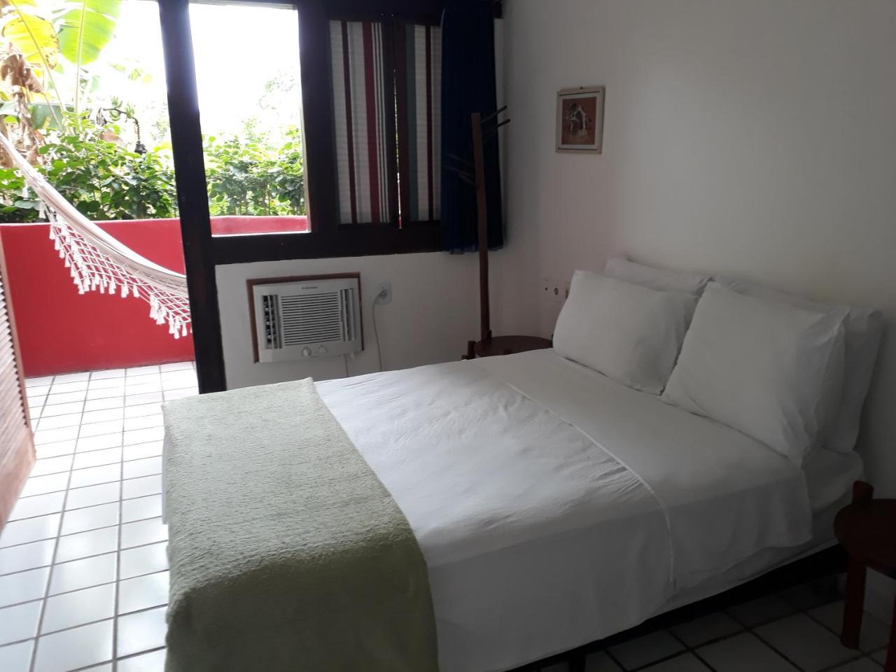 Novos Baianos Hostel E Pousada Porto Seguro Exterior foto A room at the hotel